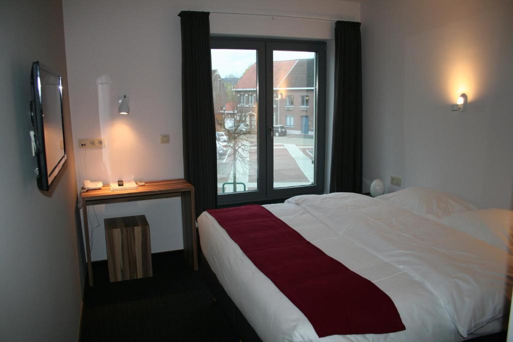 Hotel Carpinus Herent Habitación foto
